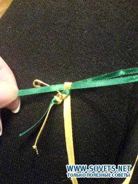 Светлая ленточка стягивается