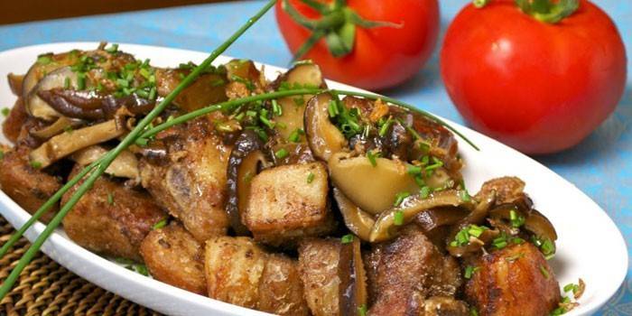 Свиное мясо с шампиньонами