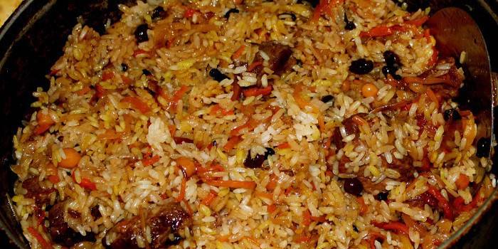 Готовый плов с мясом утки в казане