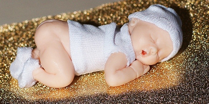 Фигурка младенца