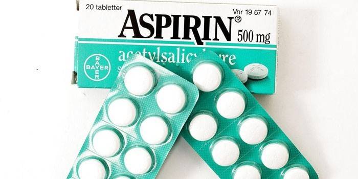 Таблетки Аспирин в упаковке