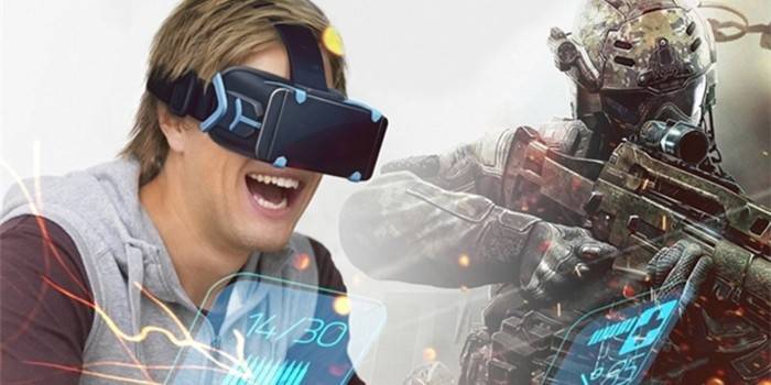 Парень в очках виртуальной реальности играет в компьютерную игру